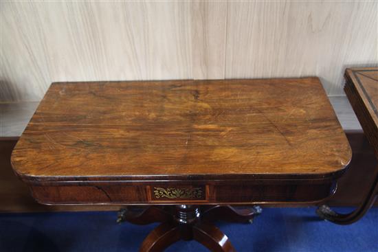 A pair of Regency rosewood card tables, W.2ft 11in. D.1ft 5.5in. H.2ft 4in.